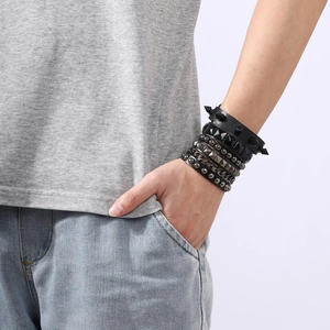 Punk style multi-layer black leather bracelet set with silver studs and metal spikes