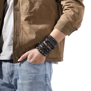 Set of 4 punk style black leather bracelets with metallic studs and cross for men