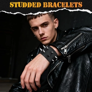 Black leather punk bracelet with silver conical studs worn with a biker jacket