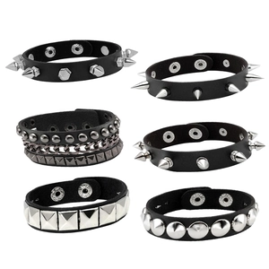 Gothic punk leather bracelet set featuring metal spikes and rivets with snap closures