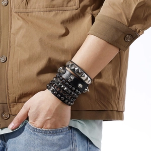 4-piece men's punk chain bracelet set with studs, skull elements, and black leather straps