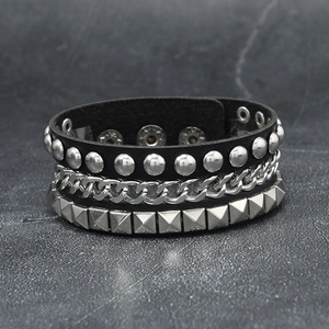 Punk multi-layer leather bracelet with silver studs, metal chains, and adjustable buckles