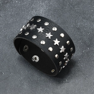 Punk rock black leather wide cuff bracelet with star rivets and adjustable snap buttons