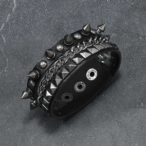 Black PU leather punk bracelet with metal spikes, studs, and chains with triple snaps