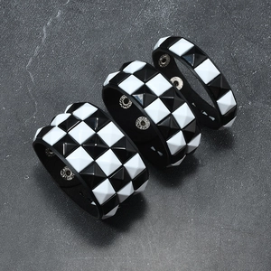 Punk style PU leather rivet bracelets set with black and white pyramid studs for couples