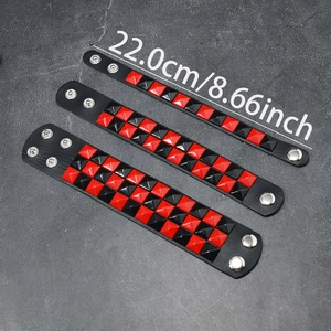 Punk black leather wristband set with red and black square pyramid studs 22cm long
