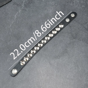 Gothic punk black leather bracelet with silver metal spikes and adjustable snap buttons