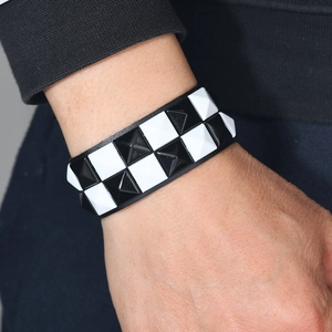 Punk style faux leather bracelet with black and white pyramid studs for men and women