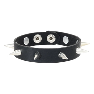 Detail view of adjustable black punk leather bracelet with five silver metal spikes