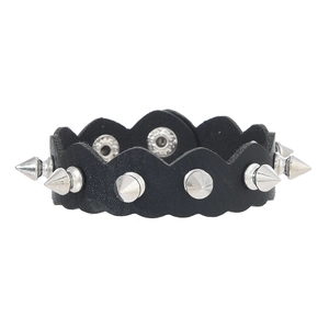 Punk style black leather bracelet with silver metal spikes and adjustable snap buttons