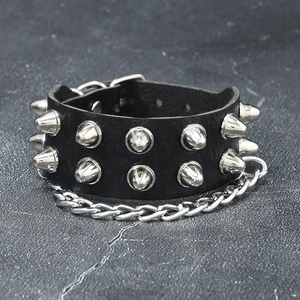 Close-up of black PU leather punk bracelet with silver cone studs and metal chain detail