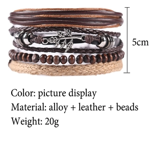 Detail of multi-layer leather bracelet with alloy leaf charm and dark wood beads