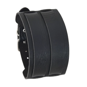 Close-up of wide black leather punk bracelet with silver buckle and natural grain texture