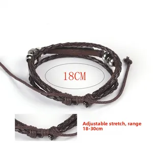 Close-up of brown multilayer braided leather bracelet with adjustable drawstrings
