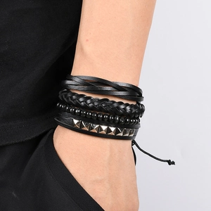 Men's punk layered leather bracelet set with pyramid studs and black braided strands