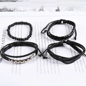 Men's 4-piece punk layered leather bracelet set with silver pyramid studs and beads