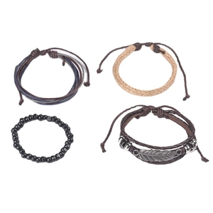 Set of 4 vintage leather bracelets featuring alloy feather charms and wooden beads