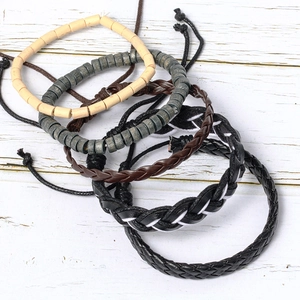 Retro multi-layer woven bracelet set featuring wooden beads and braided wax rope