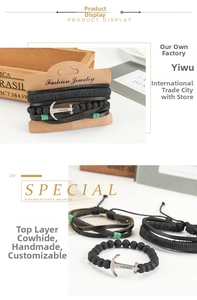 Close-up of a 4-piece set of men's multilayer leather bracelets with a Viking anchor motif
