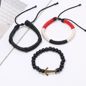 Three-piece nautical leather bracelet set with woven ropes and bronze viking anchor charm