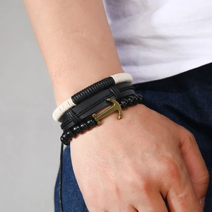 Three-piece nautical leather bracelet set featuring a bronze anchor charm with Vikings text