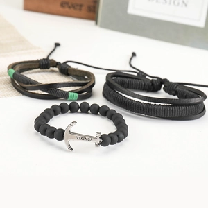 Three-piece set of men's braided leather bracelets with matte beads and silver anchor charm