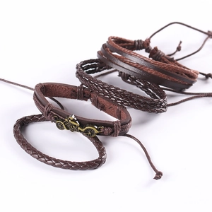 Men's retro multi-layer leather bracelet set with bronze motorcycle charm and woven ropes