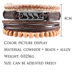 Detail of dolphin charm, wooden beads, and adjustable brown leather multilayer bracelet