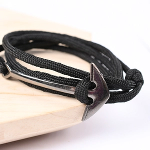 Handmade nautical anchor bracelet with black braided nylon rope and silver metal buckle
