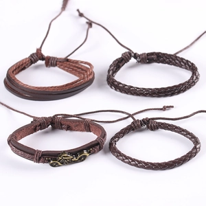 Retro punk set of four brown leather bracelets with vintage motorcycle alloy charms