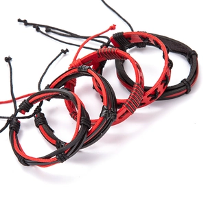 Handmade red and black braided leather bracelet set featuring punk rock style wrap design