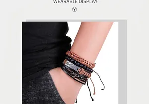 Detail of multi-layer leather bracelet set with Believe engraved metal plate and beads