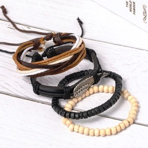 Handmade multilayer leather bracelet set with wooden beads and silver feather charm