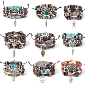 Bracciale Multistrato in Pelle e Perline Vintage per Uomo e Donna Set Boemo con Perline di Legno e Turchese Sintetico Pendente Gufo Piuma Gioielli