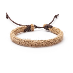 Macro detail of handmade woven tree of life bracelet with natural hemp fiber textures
