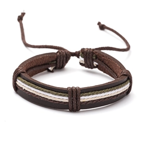 Detail view of multilayer braided leather bracelet with adjustable drawstring closure cord
