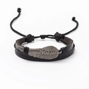 Men's woven leather bracelet with silver metal wing charm and adjustable cord