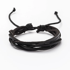 Close-up of black multilayer braided leather bracelet with adjustable sliding knot details