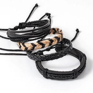 Set of four men's braided leather and hemp rope multilayer bracelets in black and natural