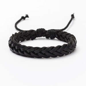 Detailed view of woven black leather cord bracelet with adjustable pull-string closure