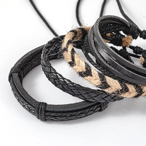 Men's retro multi-layer braided leather and hemp rope bracelet set on white background