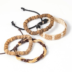 Detail of 4-piece handmade set with coconut beads, hemp ropes and leather braided bracelets