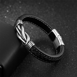 Black braided leather bracelet for men with silver infinity knot and contrast stitching
