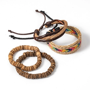 Close-up of bohemian woven bracelets set with coconut wood beads and braided hemp fiber