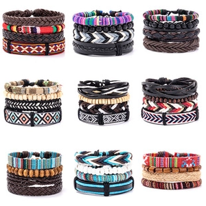 Detail of multi-layer leather braided bracelets with beads in various ethnic styles
