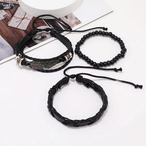 Men's vintage black leather bracelet set featuring 3 multilayer woven bands and feather charm