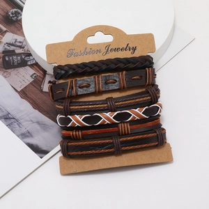 Set of six vintage braided leather bracelets for men in dark brown and black tones