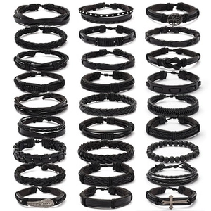 Macro view of 27-piece black leather beaded bracelet set with punk style charms