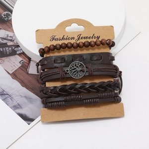 Set of four vintage brown leather bracelets featuring tree of life charm and wooden beads