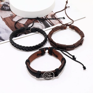 Detailed view of men's leather bracelets set featuring Tree of Life alloy charm